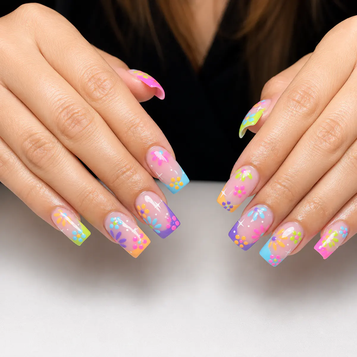 Colourful floral nail art design by Vernon's top nail technicians